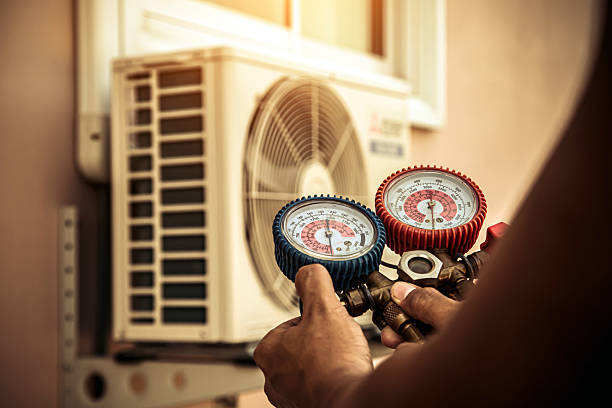 Professional Air Conditioning Service technician working in Pawnee, OK